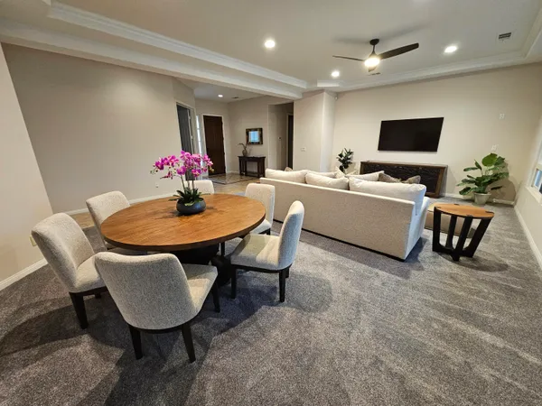 a view of a dining room with furniture