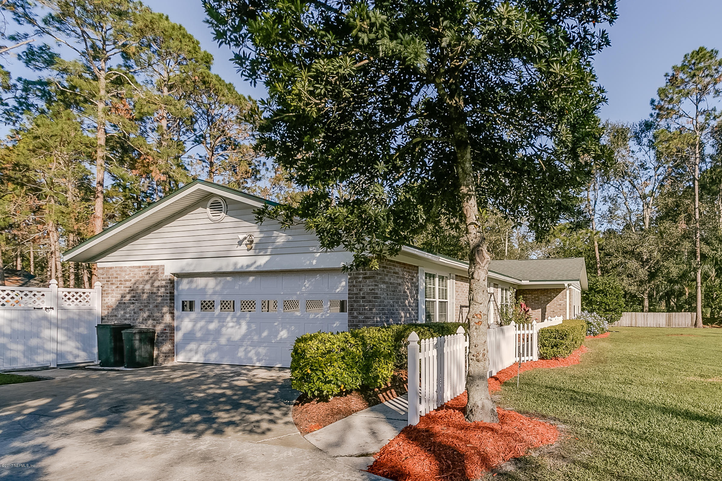4756 Pine Gate Road Fleming Island, FL 32003 - Photo 26 of 36 Garage_Entrance