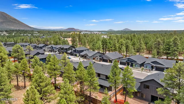 a terrace with outdoor seating and city view