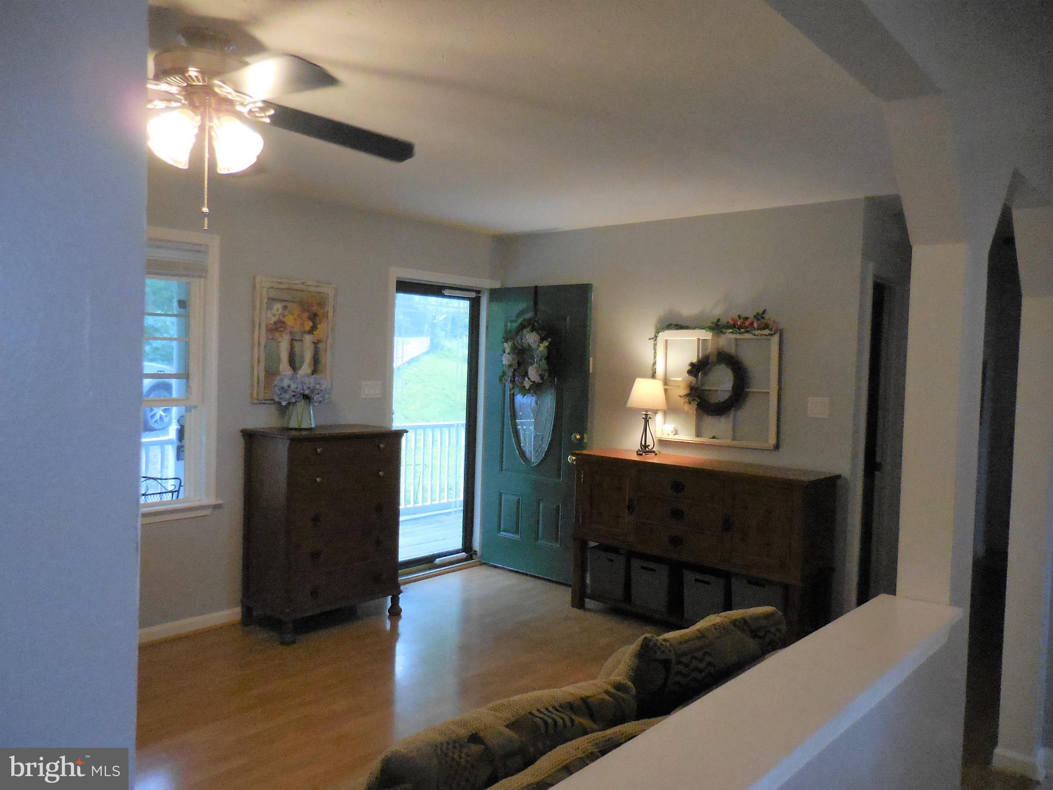 140 Arrowood Road Linden, VA 22642 - Photo 12 of 49 a view of a livingroom with furniture and chandelier