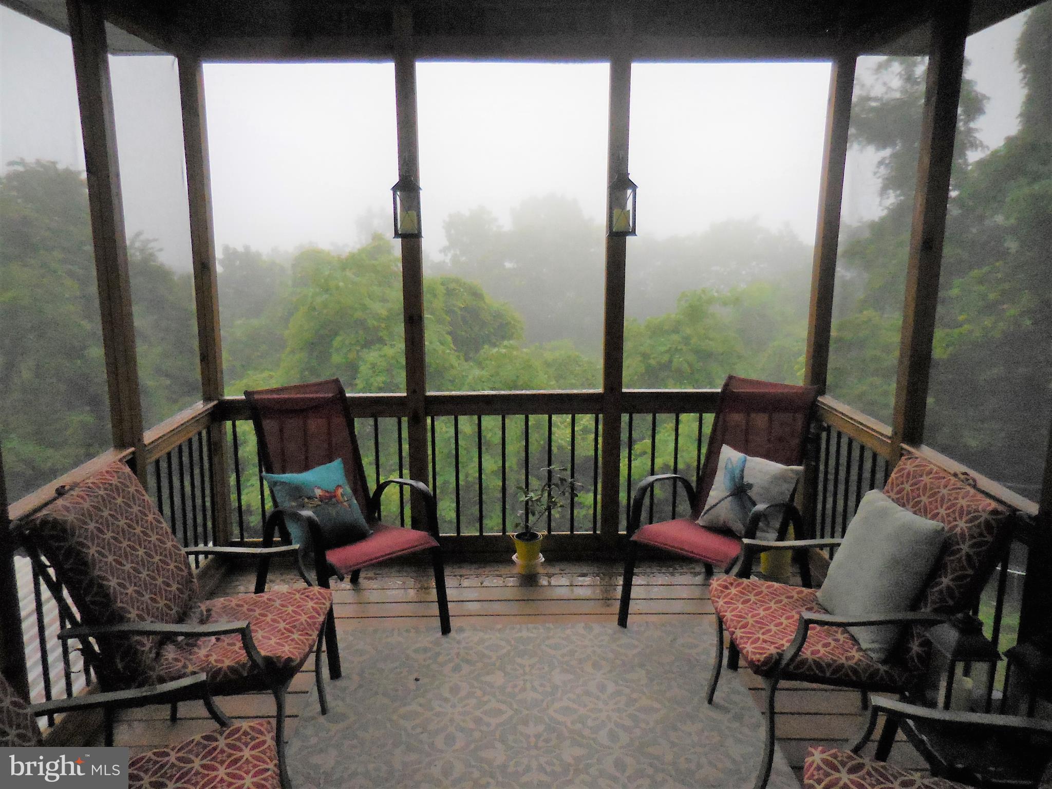 140 Arrowood Road Linden, VA 22642 - Photo 16 of 49 a view of a chair and tables in the balcony