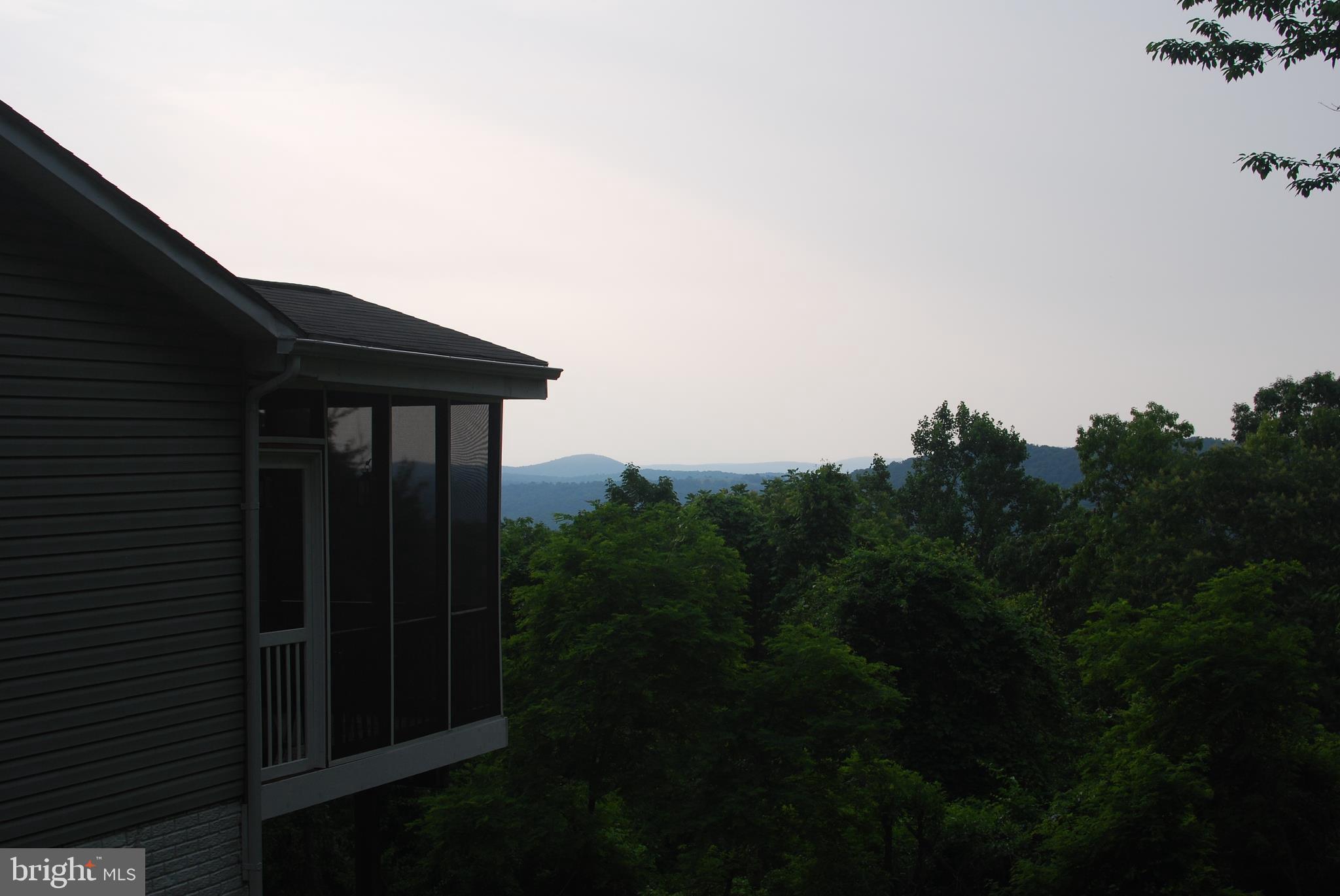 140 Arrowood Road Linden, VA 22642 - Photo 18 of 49 a backyard of a house with lots of green space