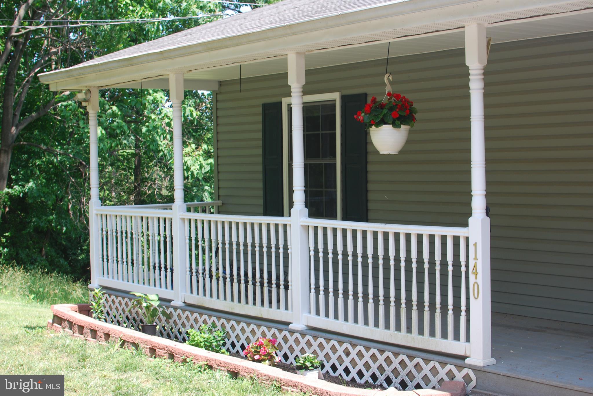 140 Arrowood Road Linden, VA 22642 - Photo 3 of 49 a view of a porch with a small yard