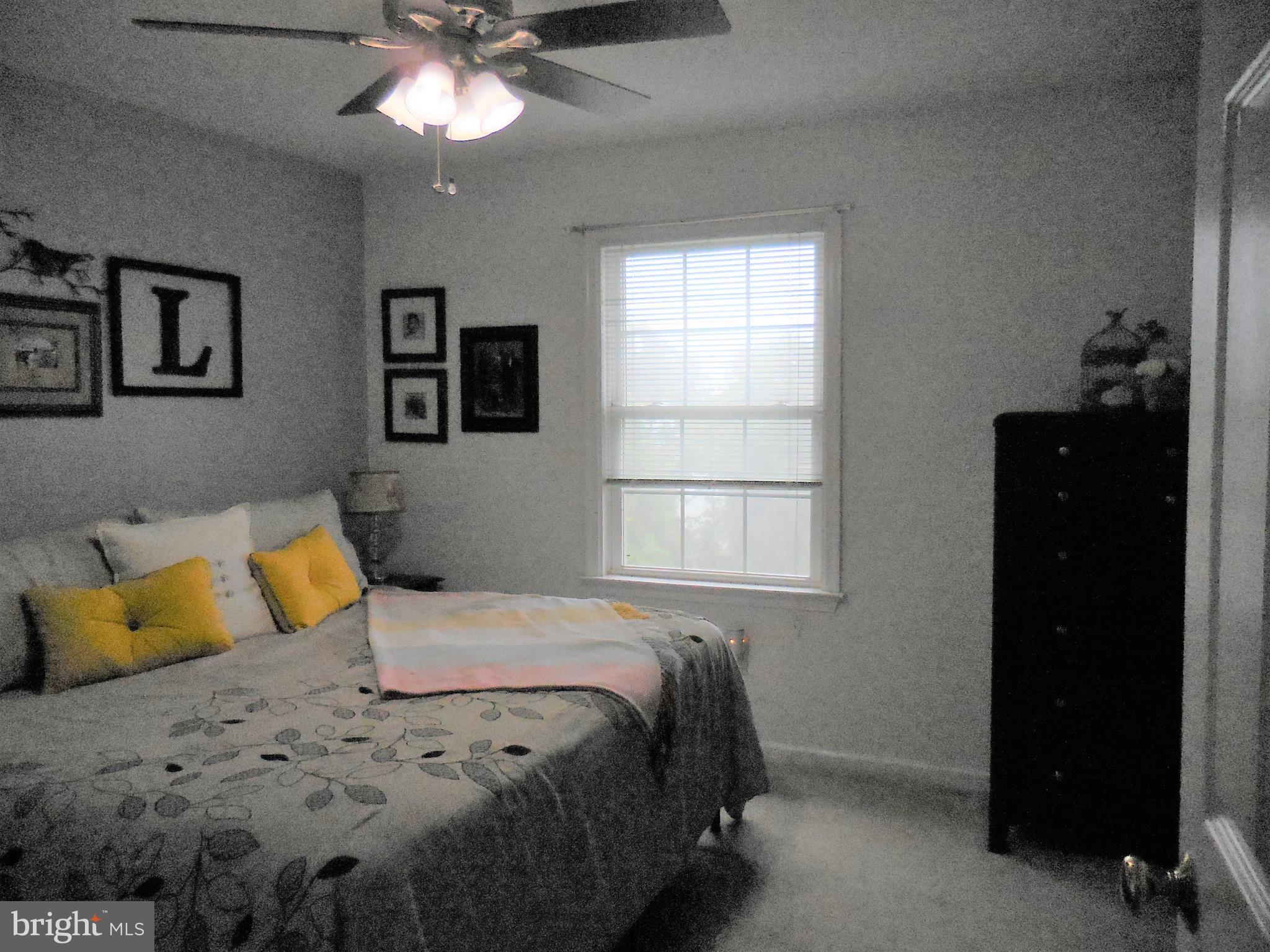 140 Arrowood Road Linden, VA 22642 - Photo 22 of 49 a bedroom with a bed and a window