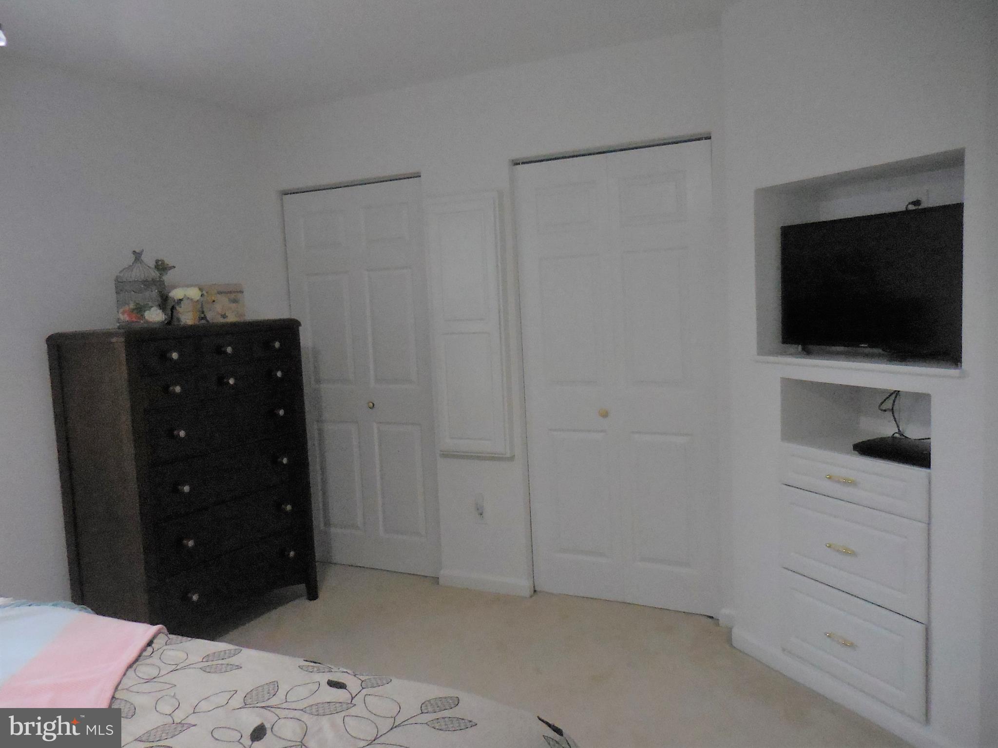 140 Arrowood Road Linden, VA 22642 - Photo 23 of 49 a living room with a bed and flat screen tv