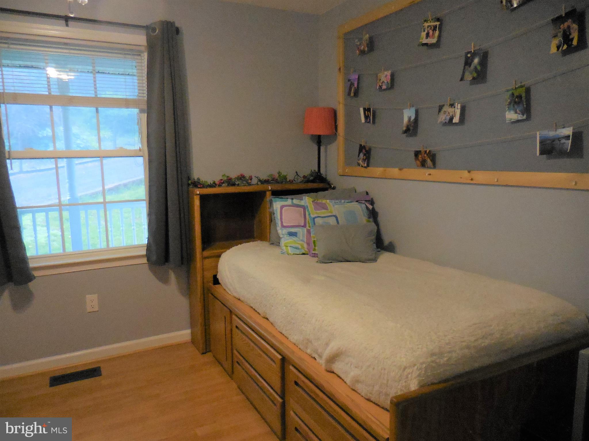 140 Arrowood Road Linden, VA 22642 - Photo 25 of 49 a bedroom with a bed and a window