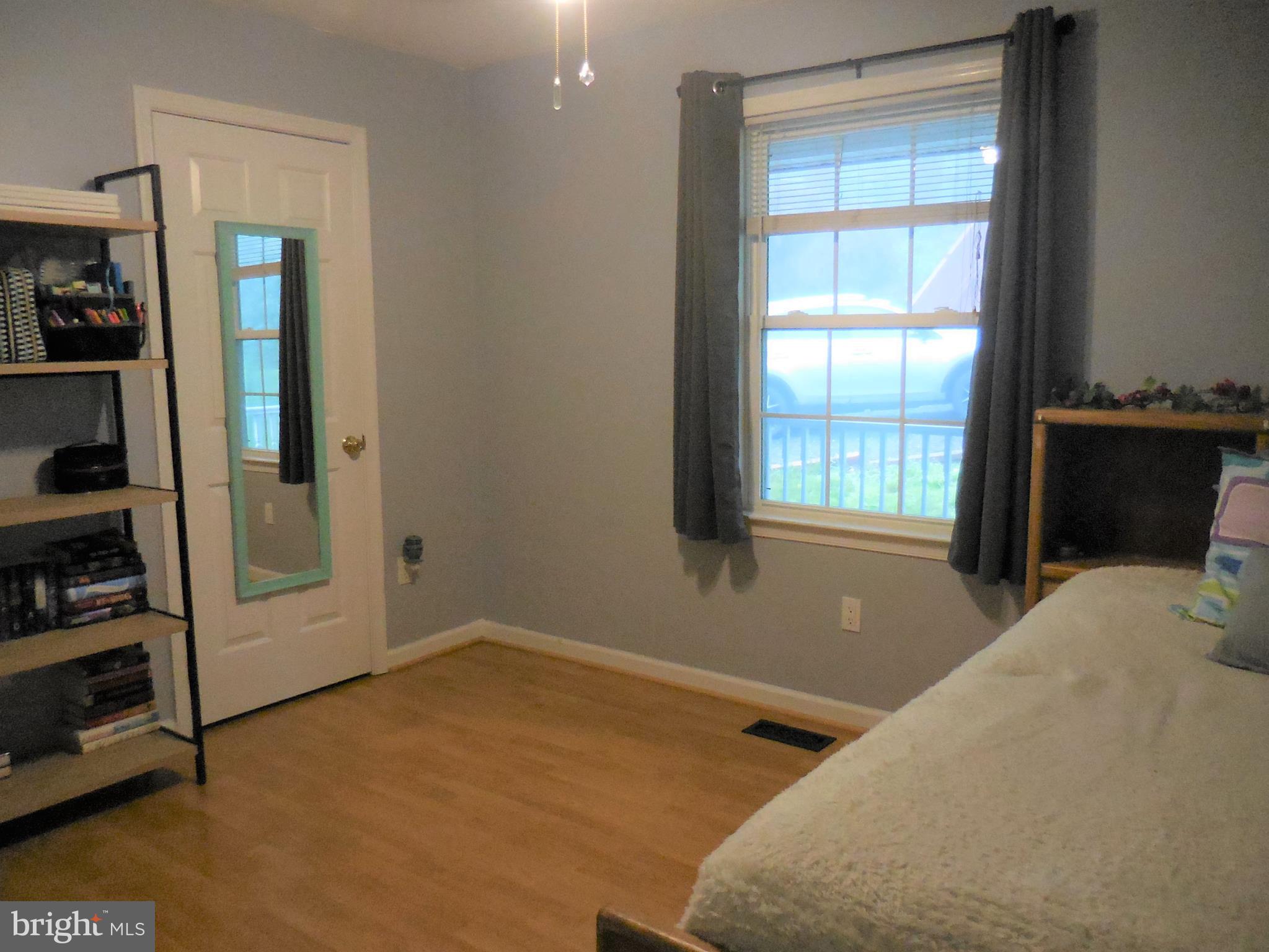 140 Arrowood Road Linden, VA 22642 - Photo 26 of 49 a bedroom with a bed and a window