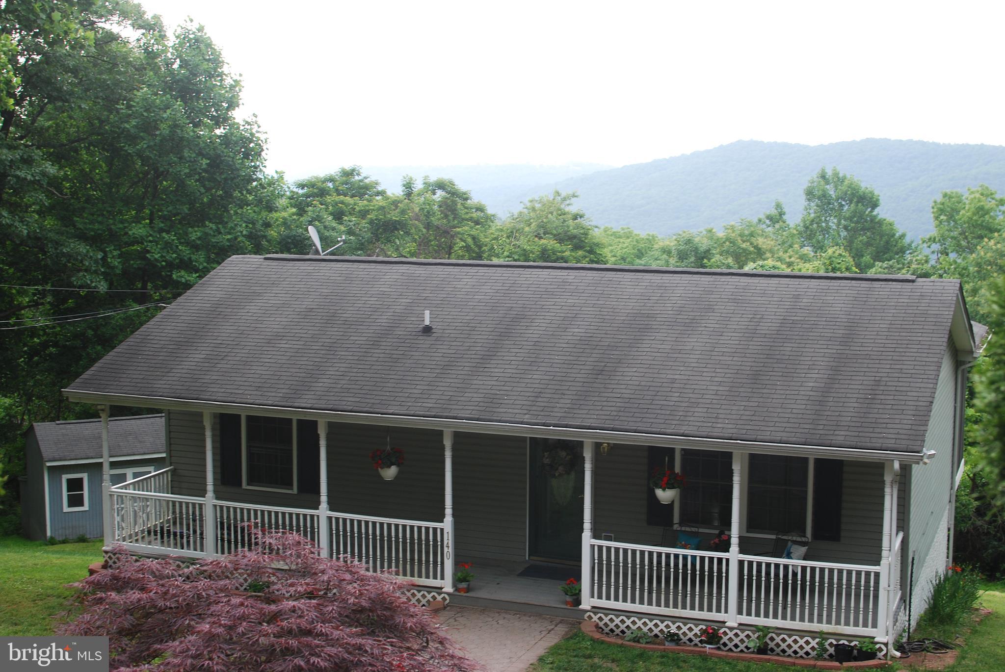 140 Arrowood Road Linden, VA 22642 - Photo 39 of 49 front view of a house with a yard