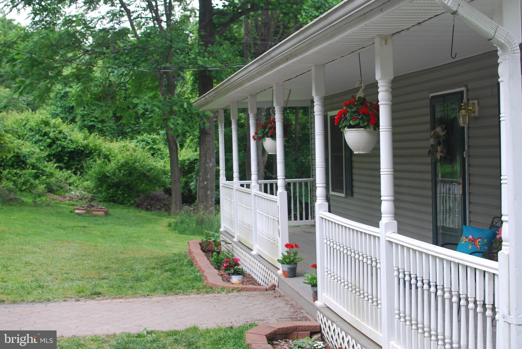 140 Arrowood Road Linden, VA 22642 - Photo 5 of 49 a front view of a house with a yard