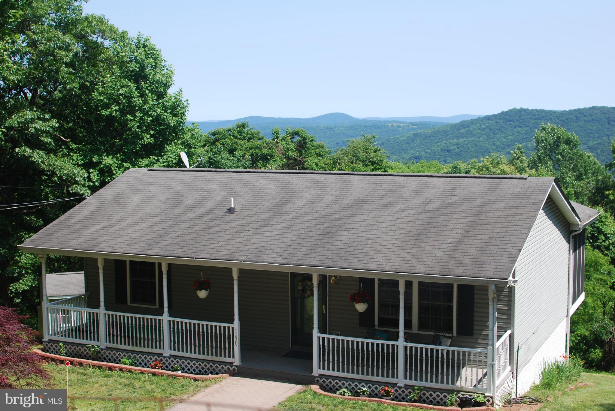 140 Arrowood Road Linden, VA 22642 - Photo 41 of 49 an aerial view of a house with a yard