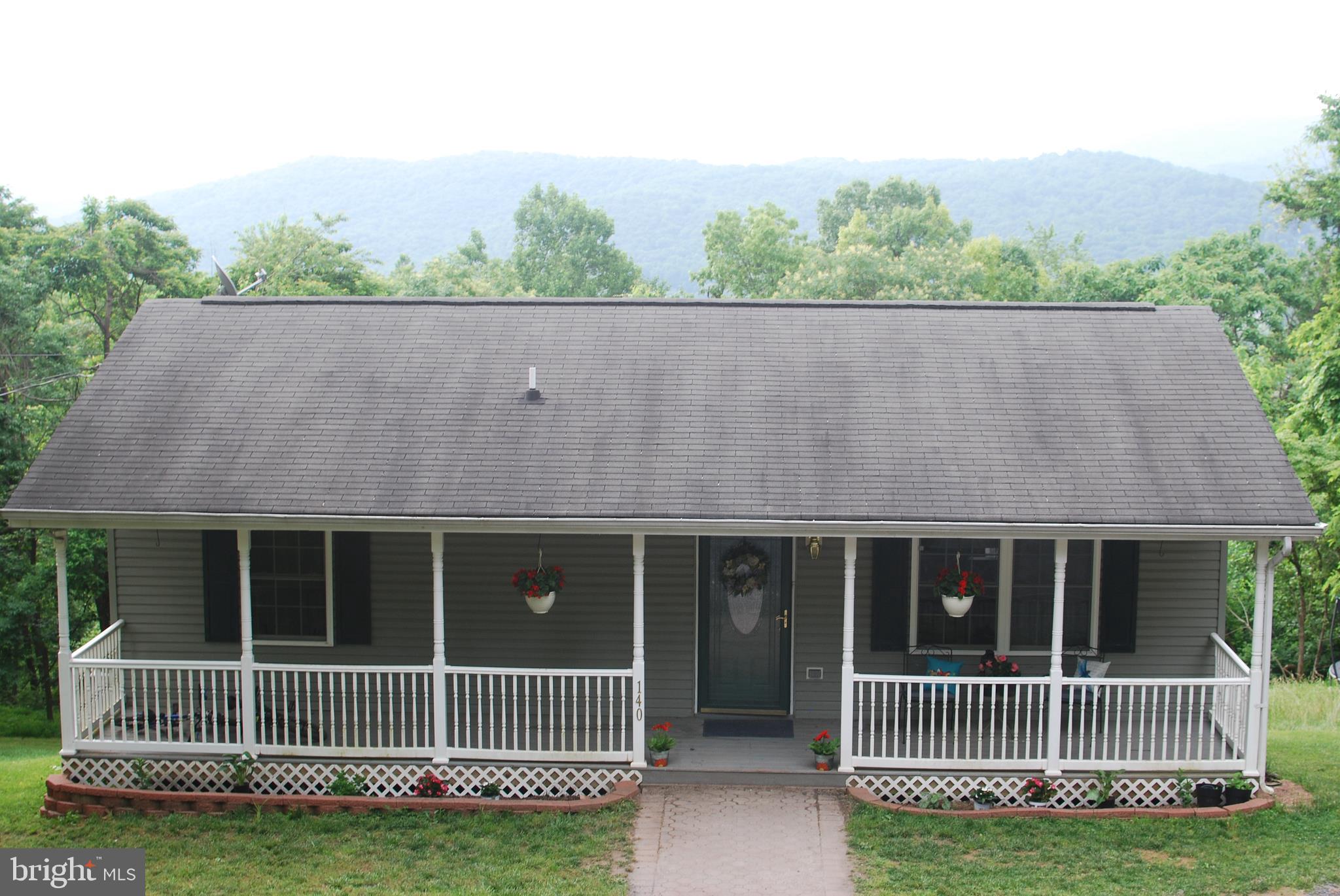 140 Arrowood Road Linden, VA 22642 - Photo 44 of 49 front view of a house with a yard