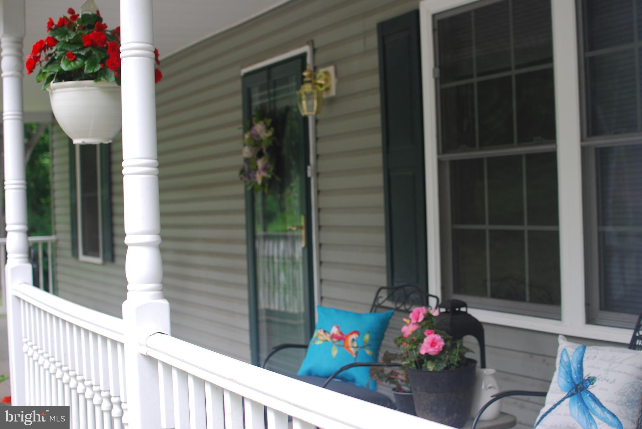 140 Arrowood Road Linden, VA 22642 - Photo 6 of 49 a view of a door and chair in the balcony