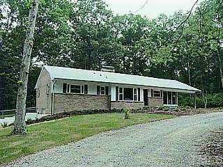 1800 Milton Road Durham, NC 27712 - Photo 1 of 1 a front view of a house with a yard
