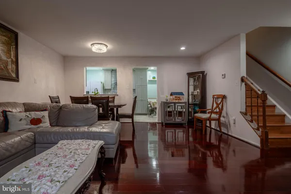 a kitchen with stainless steel appliances granite countertop a sink and a stove