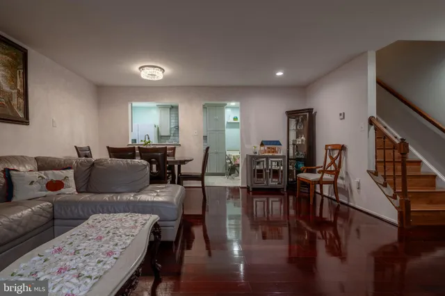 a kitchen with stainless steel appliances granite countertop a sink and a stove