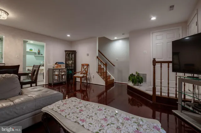 a bedroom with a bed and a sink