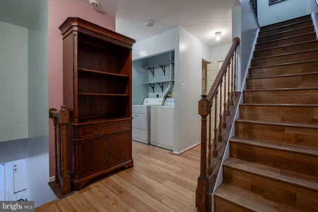 a room with furniture and wooden floor