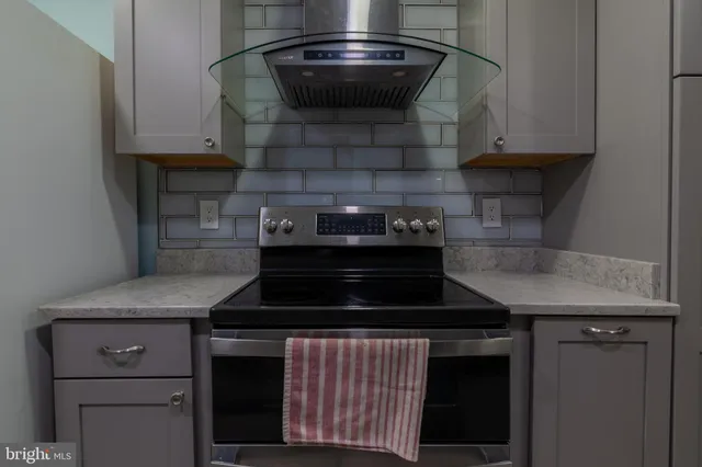 a bedroom with a bed and a chair