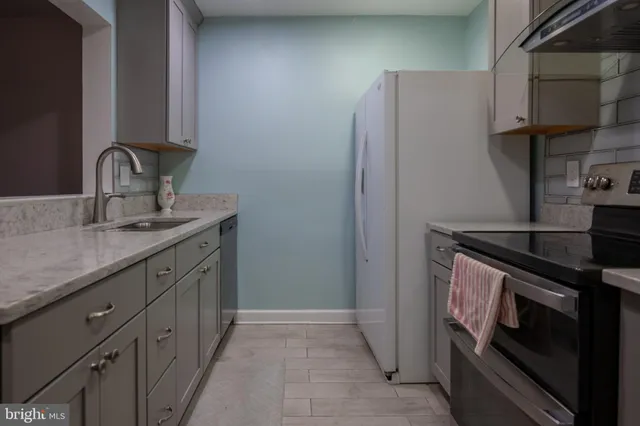 a view of a living room and hardwood floor