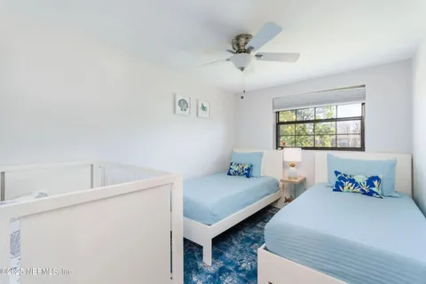 a view of a workspace with furniture