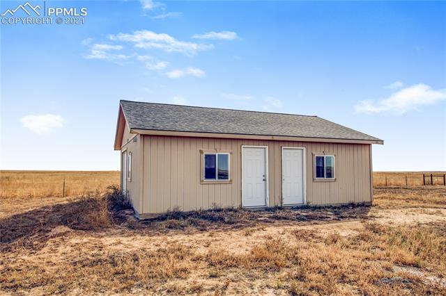 4765 South Johnson Road Rush, CO 80833 - Photo 5 of 36 3 room insulated/electric workshop with electricity/heat and insulation 24x30