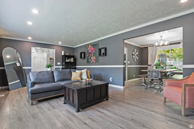 3310 Creek Road Salt Lake City, UT 84121 - Photo 12 of 49 Expansive interior living space featuring light wood-finish flooring