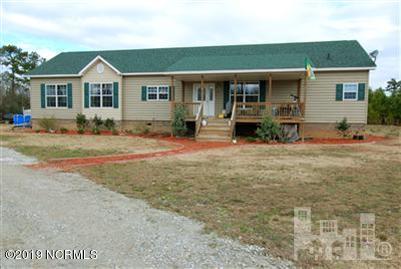 1057 Pope Road Watha, NC 28478 - Photo 1 of 24 Picture represents when seller lived at home