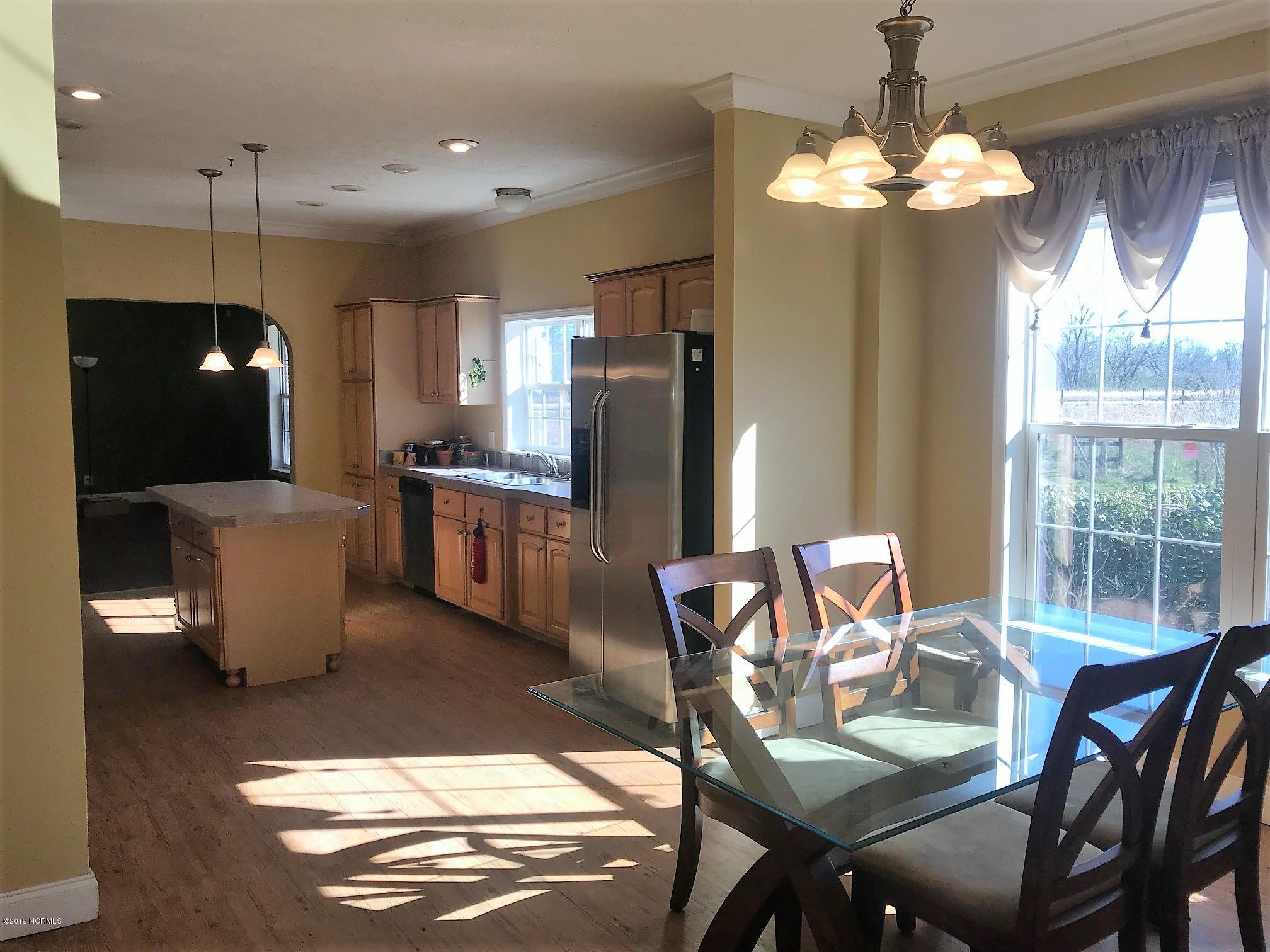 1057 Pope Road Watha, NC 28478 - Photo 6 of 24 Dining to kitchen
