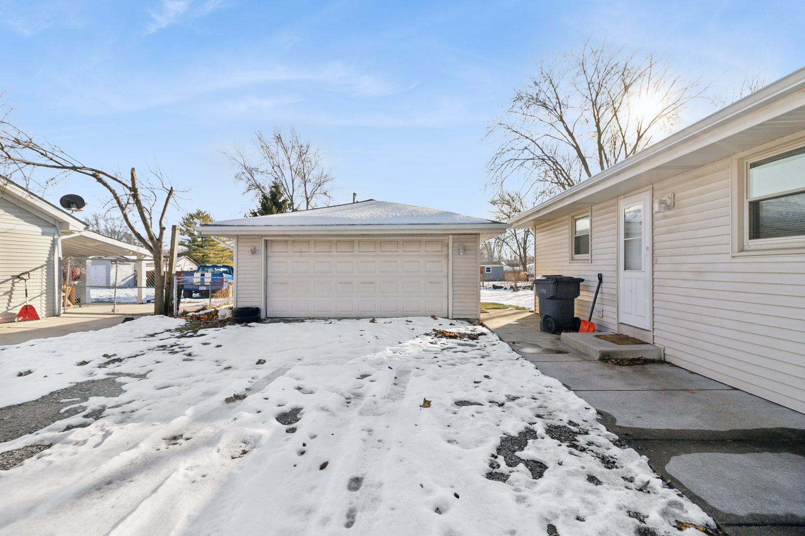 2420 Pecan Street Joliet, IL 60435 - Photo 2 of 20 a front view of a house with a patio