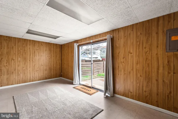 a view of a room with a large window