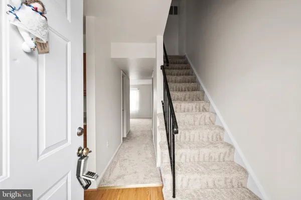 a view of an entryway with staircase
