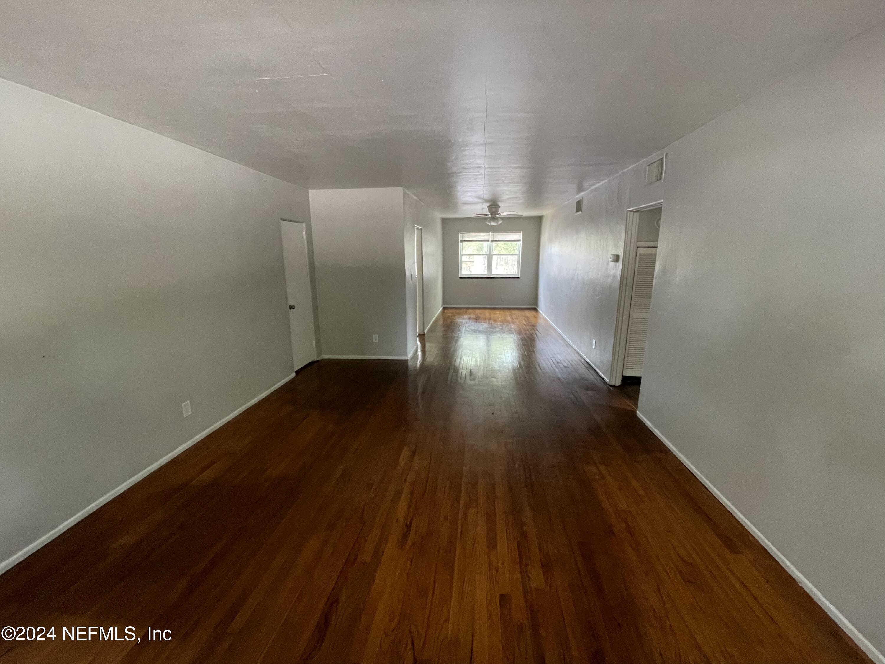 2117 Spring Park Road, Unit 2 Jacksonville, FL 32207 - Photo 8 of 9 a view of a hallway with wooden floor