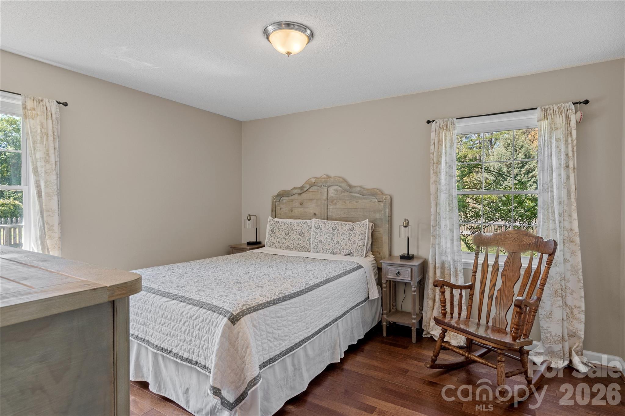 778 Reynolds Road Lewisville, NC 27023 - Photo 14 of 33 a bedroom with a bed and a window