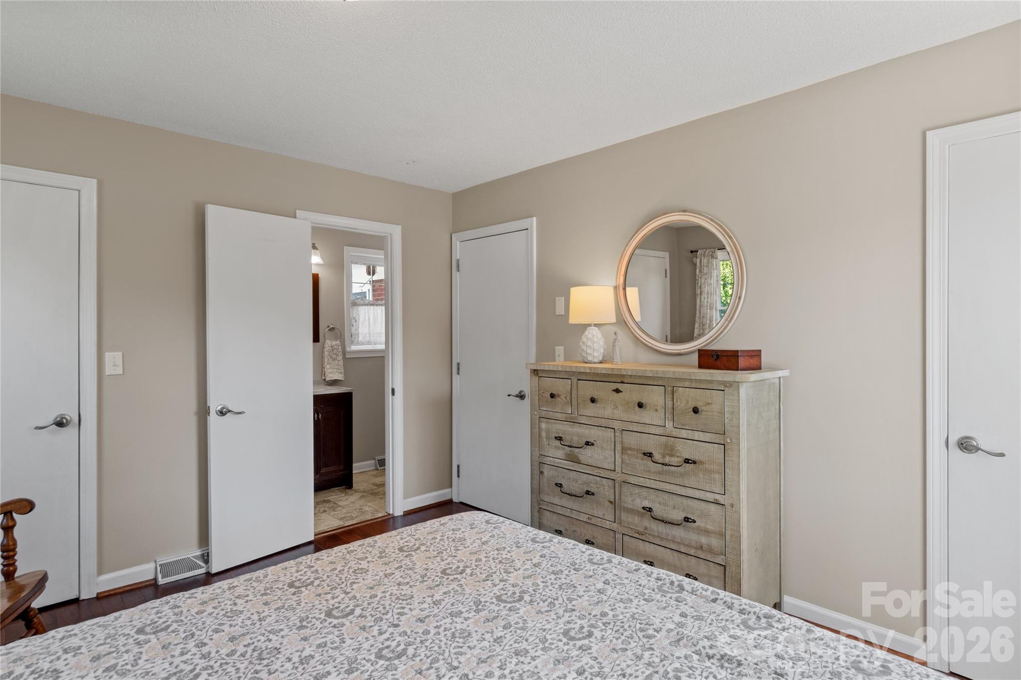 778 Reynolds Road Lewisville, NC 27023 - Photo 15 of 33 wooden floor with a dresser in it