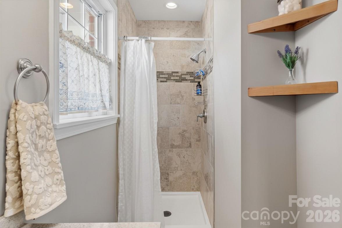778 Reynolds Road Lewisville, NC 27023 - Photo 17 of 33 a bathroom with a shower