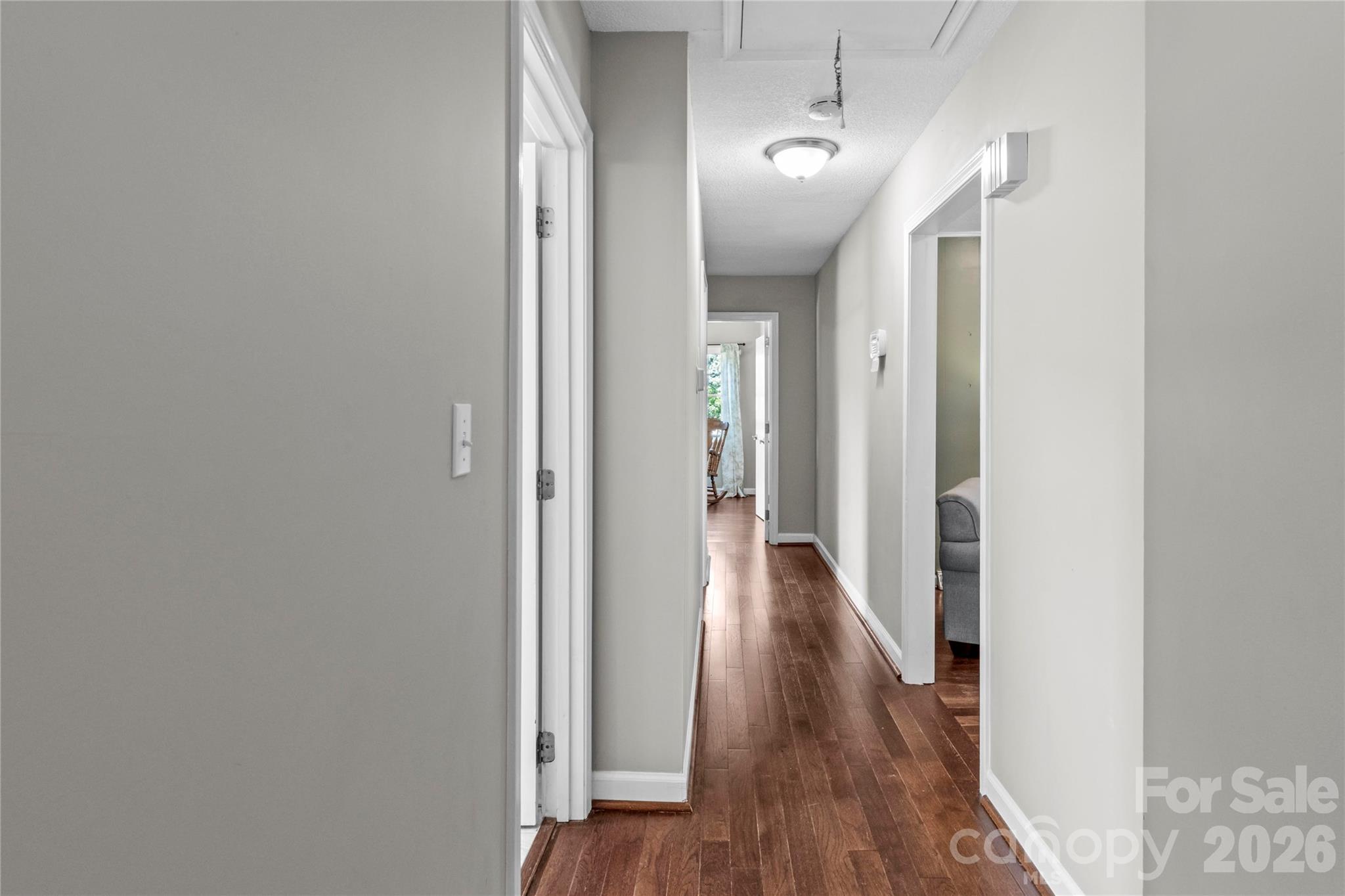 778 Reynolds Road Lewisville, NC 27023 - Photo 23 of 33 a view of a hallway with wooden floor