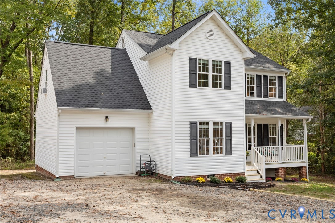 5211 Alberta Road Chesterfield, VA 23832 - Photo 4 of 43 a front view of a house with a yard