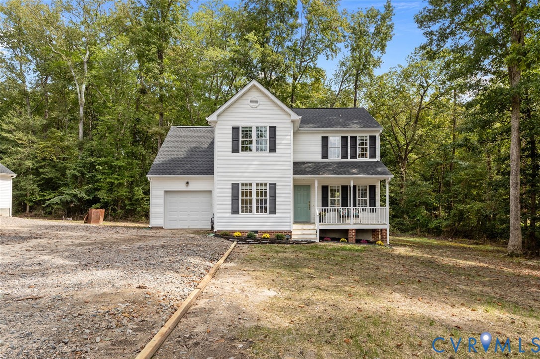 5211 Alberta Road Chesterfield, VA 23832 - Photo 5 of 43 a front view of a house with a yard