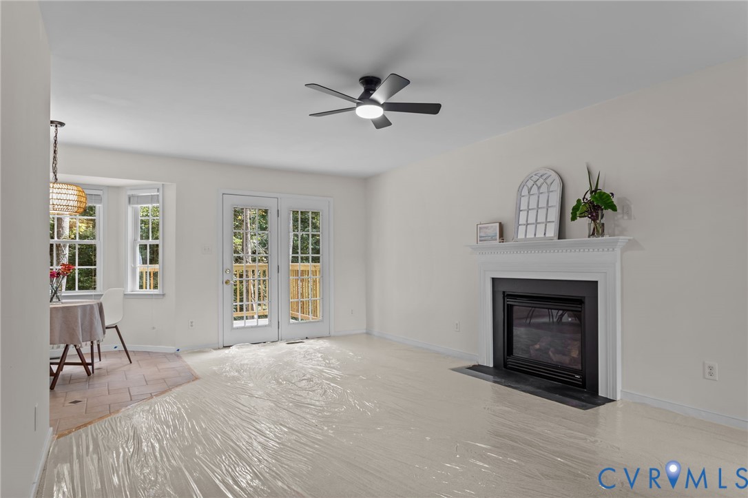 5211 Alberta Road Chesterfield, VA 23832 - Photo 9 of 43 a bedroom with a bed and a fireplace