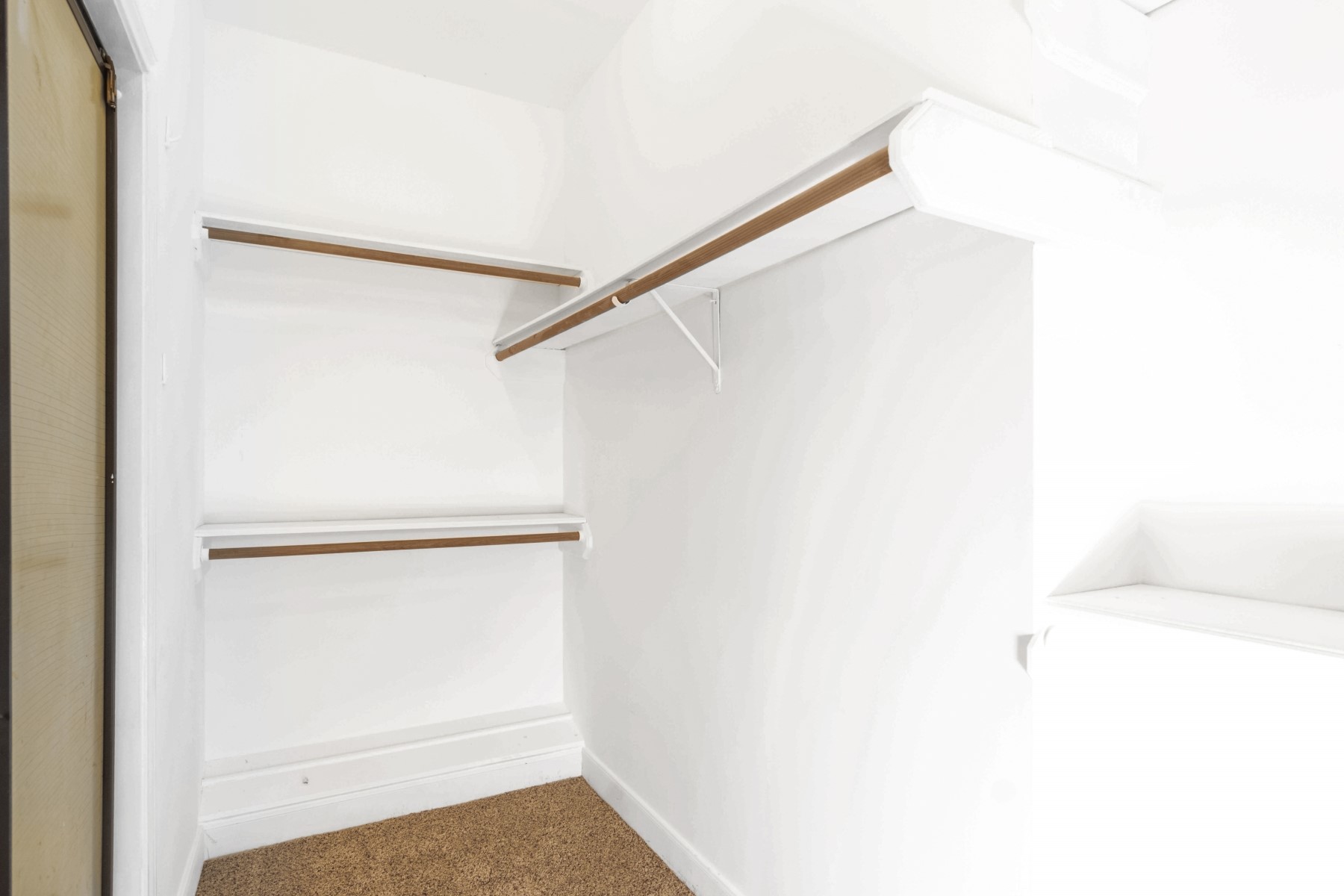 6039 Spring Creek Lane Spring, TX 77379 - Photo 38 of 48 a view of small space with racks on the wall