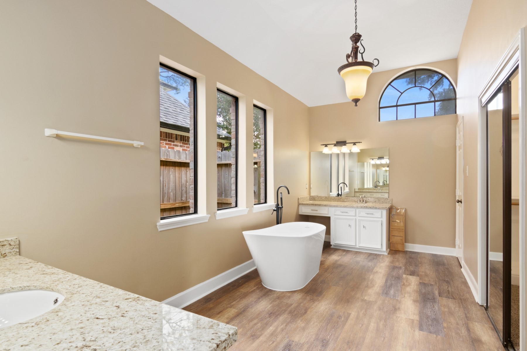 6039 Spring Creek Lane Spring, TX 77379 - Photo 42 of 48 a view of a room with window and wooden floor