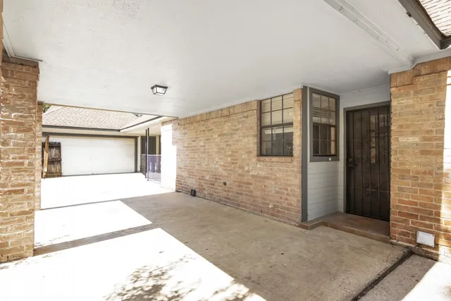 a front view of a house with a garage