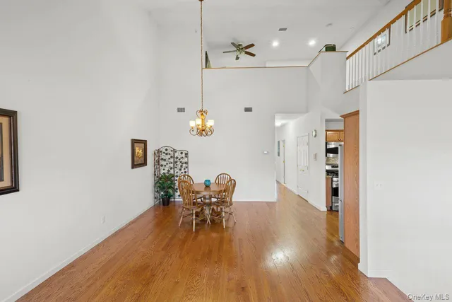 a front view of a residential apartment building with a yard