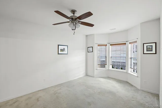 a view of dining room with furniture and wooden floor