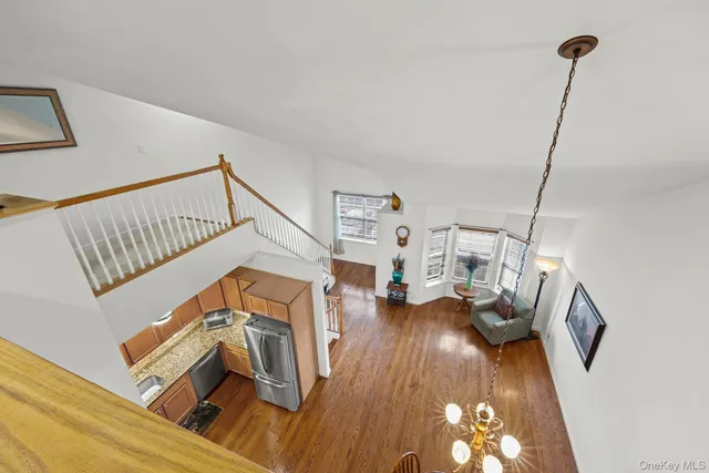 a bathroom with a toilet a sink and shower