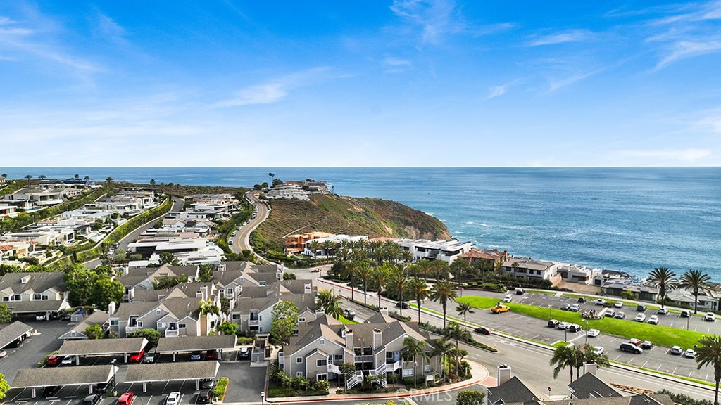 34040-127 Selva Road, Unit 127 Dana Point, CA 92629 - Photo 5 of 26 Peek a boo views of the ocean from kitchen window and doorway entering condo.