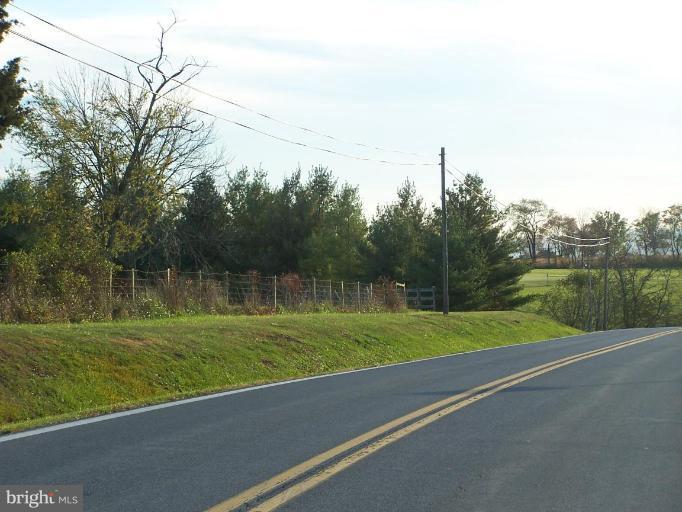 14413 Old Frederick Road Rocky Ridge, MD 21778 - Photo 9 of 26 a view of a field with a big yard