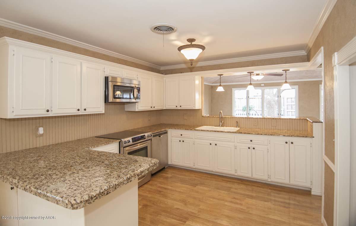 8217 Lamount Drive Amarillo, TX 79110 - Photo 9 of 51 KITCHEN VIEW 2