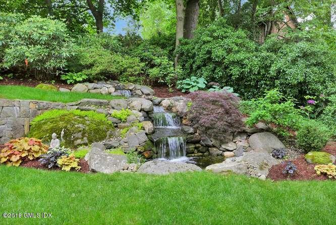 23 Stoney Ridge Lane Riverside, CT 06878 - Photo 3 of 21 a view of a garden with a building