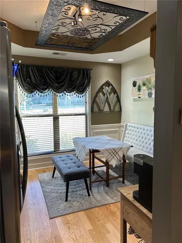 a view of a livingroom with furniture and window